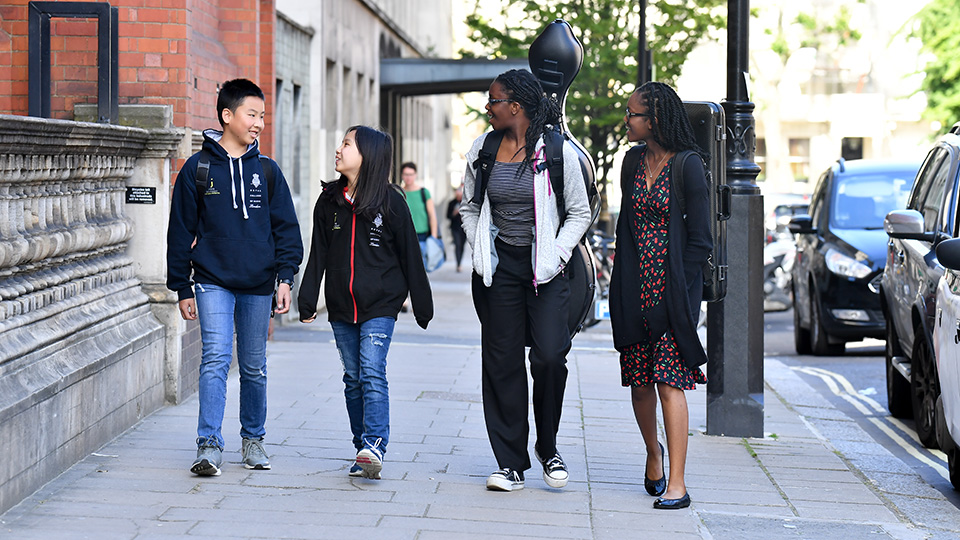 RCMJD students walking past Blomfield Building